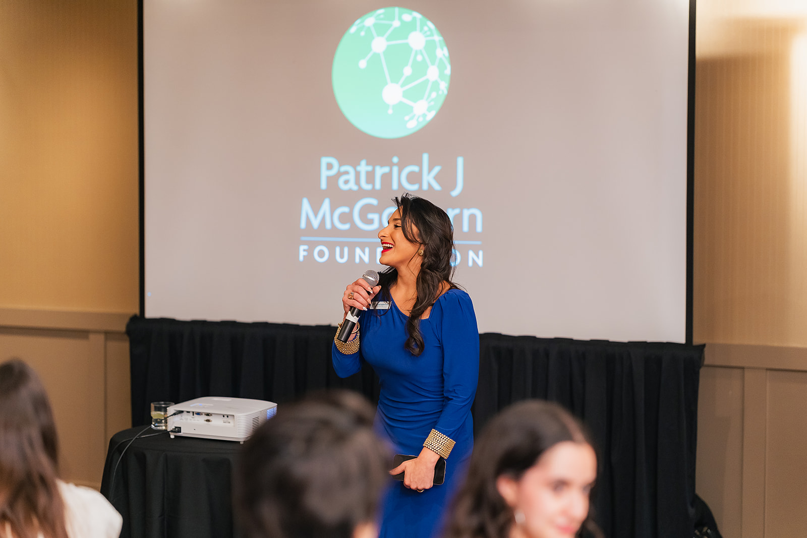 Mary Rodriguez speaking on stage